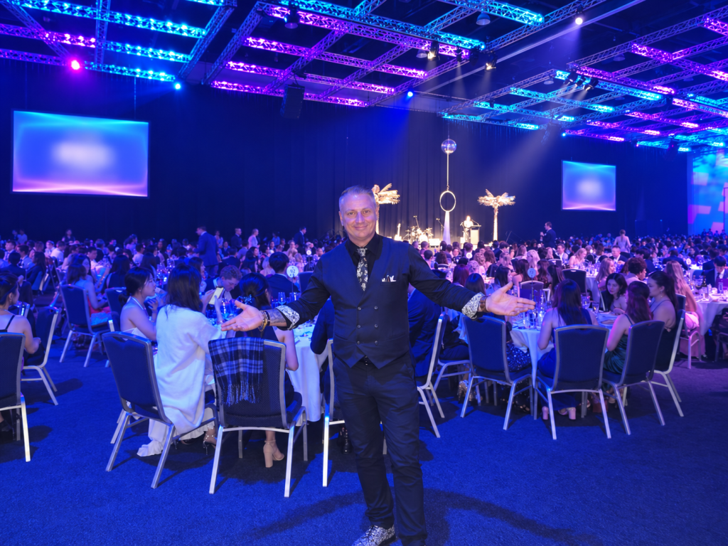 Dr Ace entertaining students at an end-of-year school formal on the Gold Coast